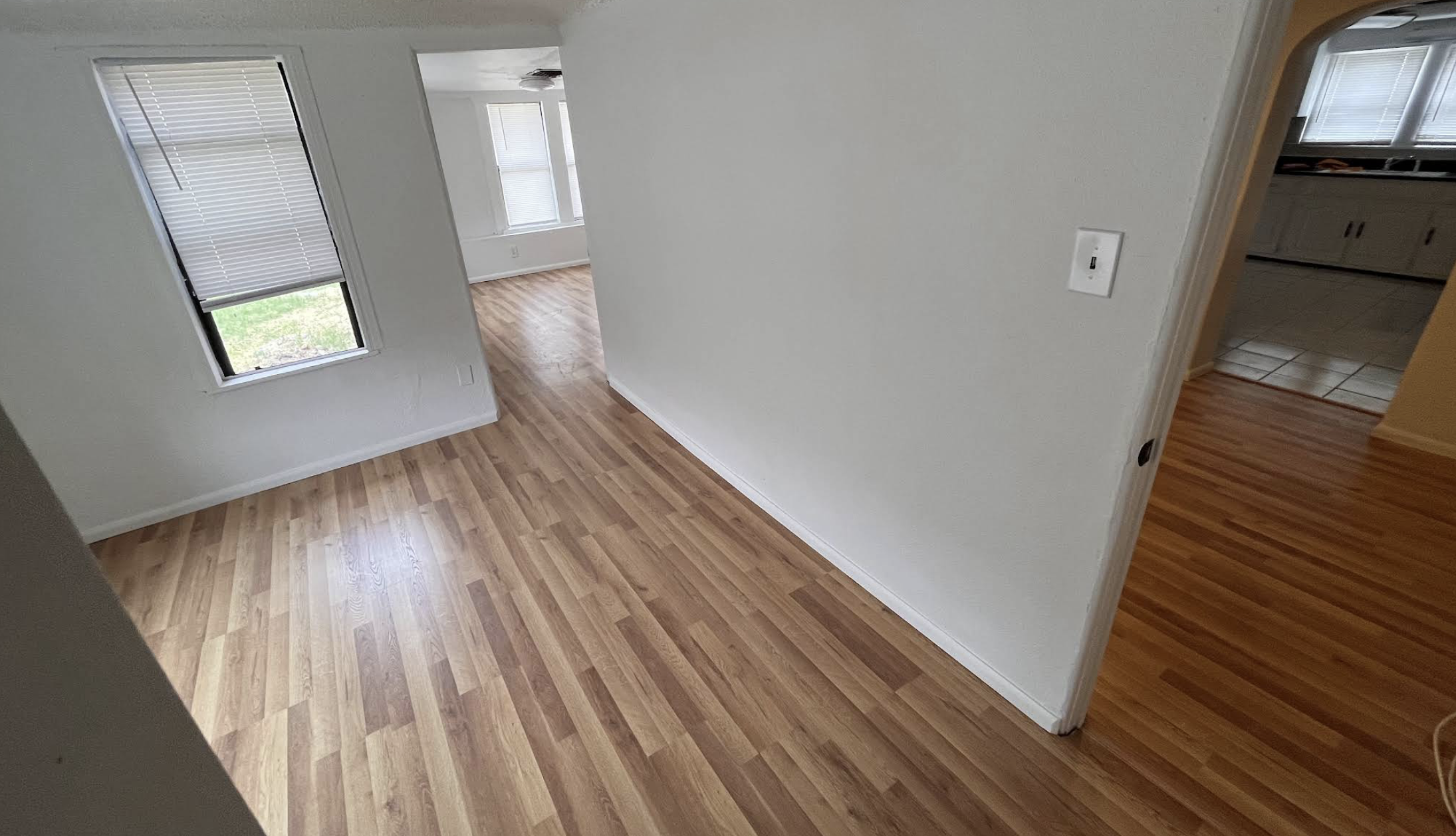Freshly painted interior with wood flooring