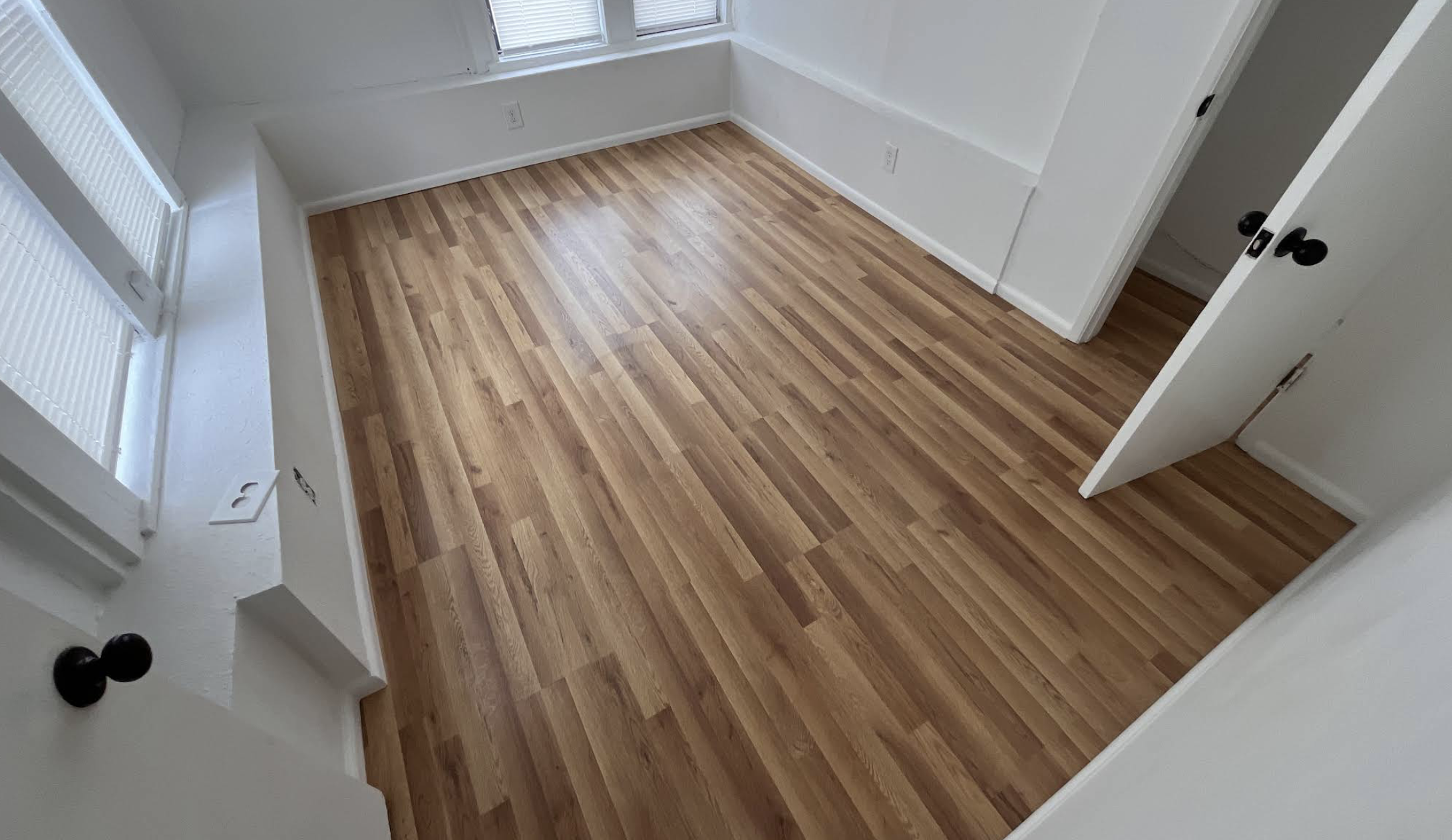 Bright room with new wood-look flooring